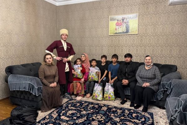 Поздравление с Наступающим Новым годом семью  К.М. Остарханова